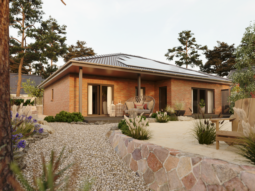 Bungalow 128 Gartenansicht mit Klinkerfassade in Spreeland Bungalow 128 mit heller Spreeland-Klinkerfassade, großzügiger Terrassenbereich und geschwungener Kiesweg